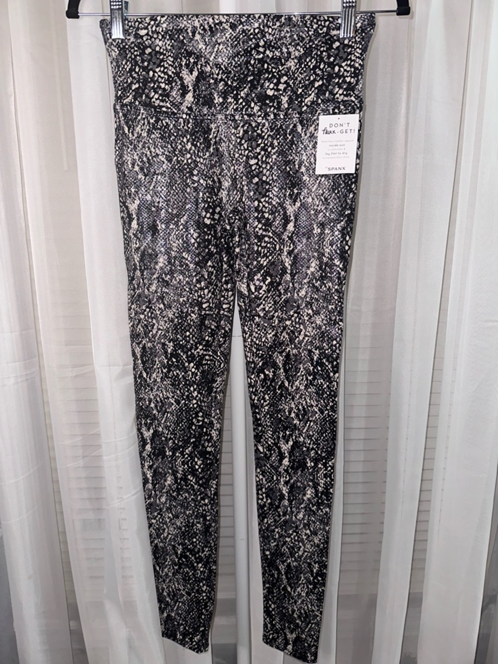 SPANX Black High-Waist Leggings with Red Logo Tag